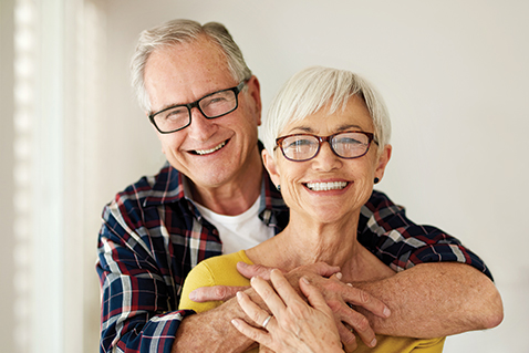A married couple smiling. Links to Closely Held Business Stock A married couple smiling. Links to Closely Held Business Stock