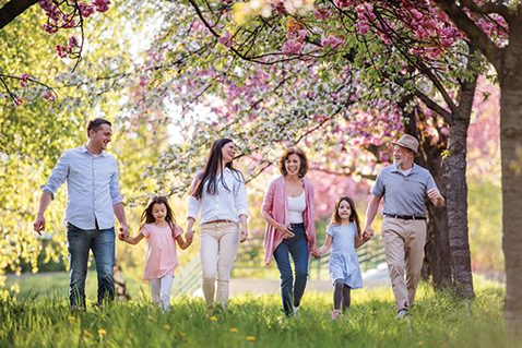 A family walking together. Links to Tangible Personal Property A family walking together. Links to Tangible Personal Property