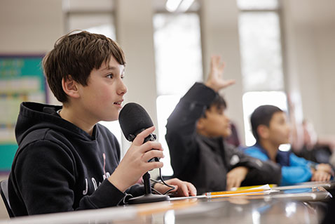 Students in class. Links to Gifts by Will