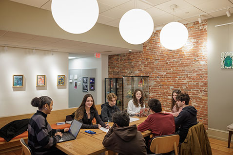 A group of students studying. Link to Beneficiary Designations
