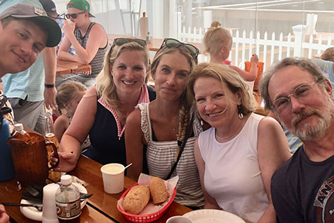 A family smiling. Link to Life Stage Gift Planner Ages 45-65 Situations.