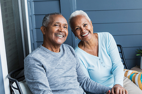 An older couple smiling. Links to Gifts of Life Insurance An older couple smiling. Links to Gifts of Life Insurance